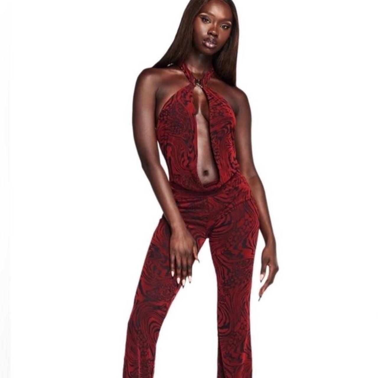 I am Gia jumpsuit. Red and black velvet design. Only... - Depop