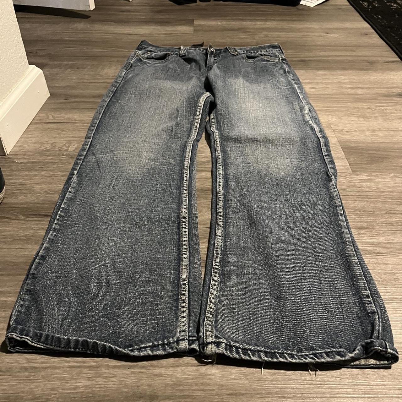 baggy bootcut flared emo y2k helix jeans with insane... - Depop