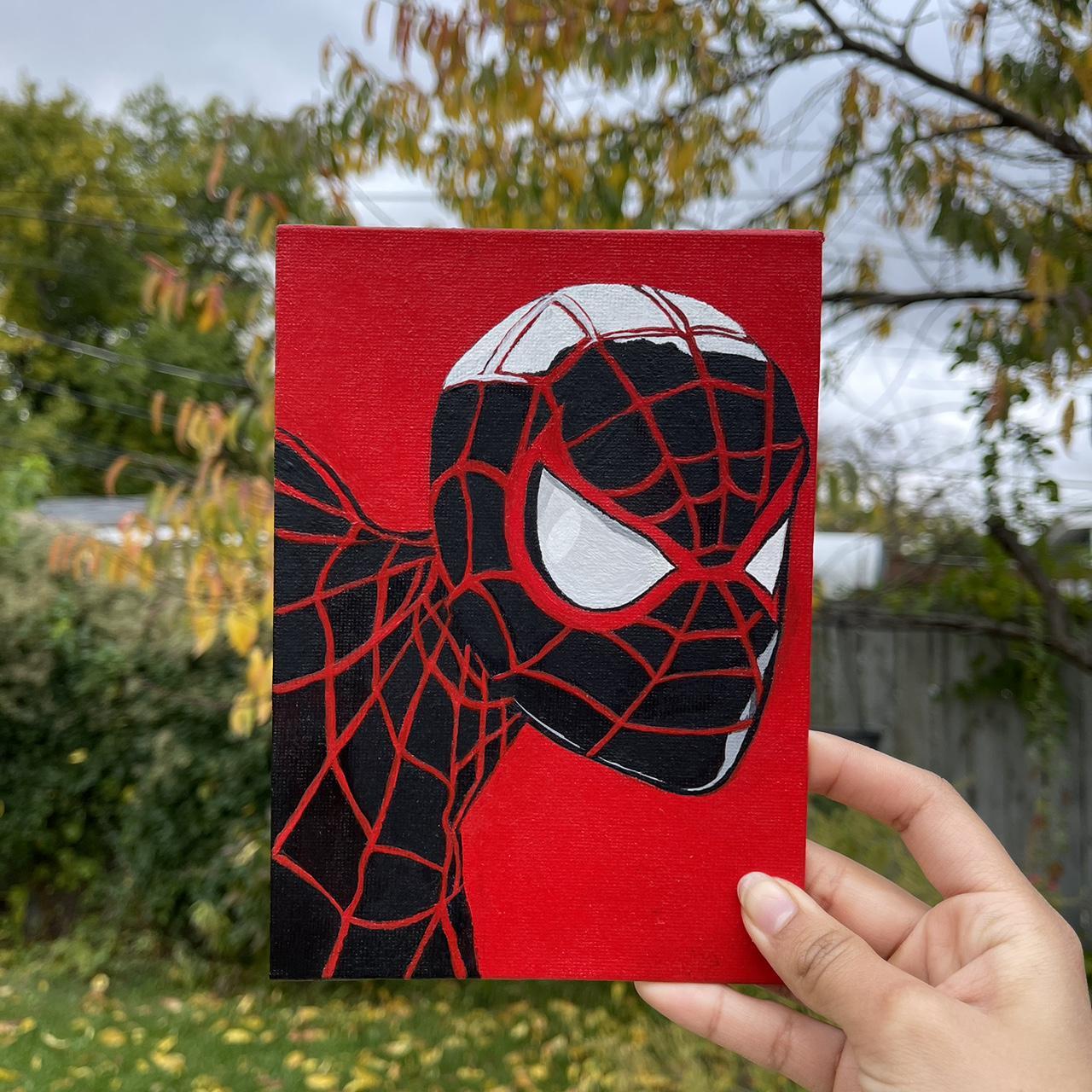 Spiderman selling painting