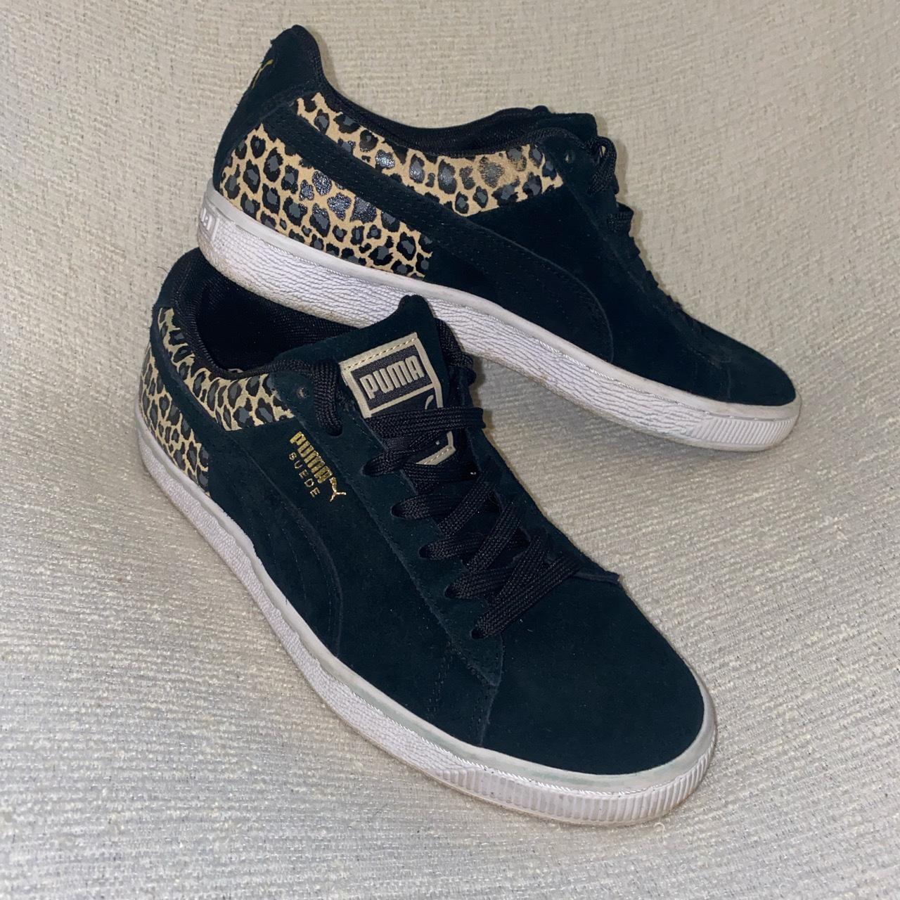 Black and gold pumas print best sale