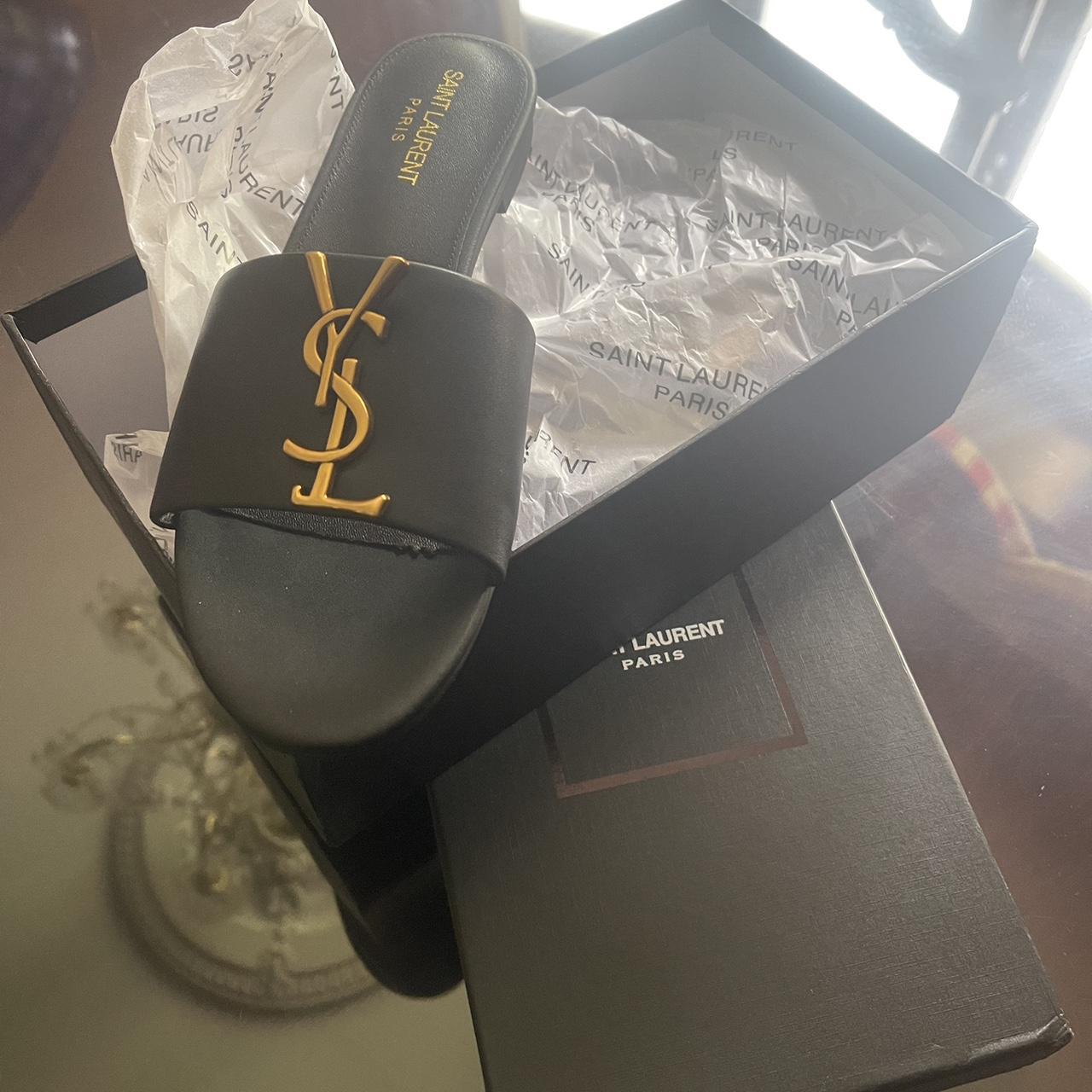 Yves Saint Laurent Women's Black and Gold Slides Depop