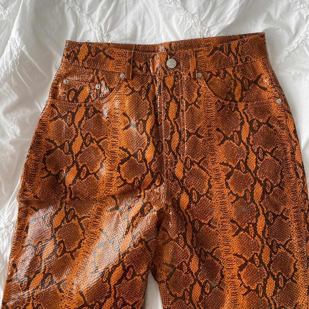 GRLFRND orange snakeskin faux leather pants,