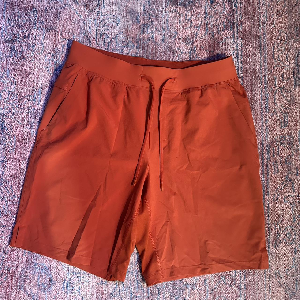 men’s orange athletic shorts tag is ripped off but... Depop