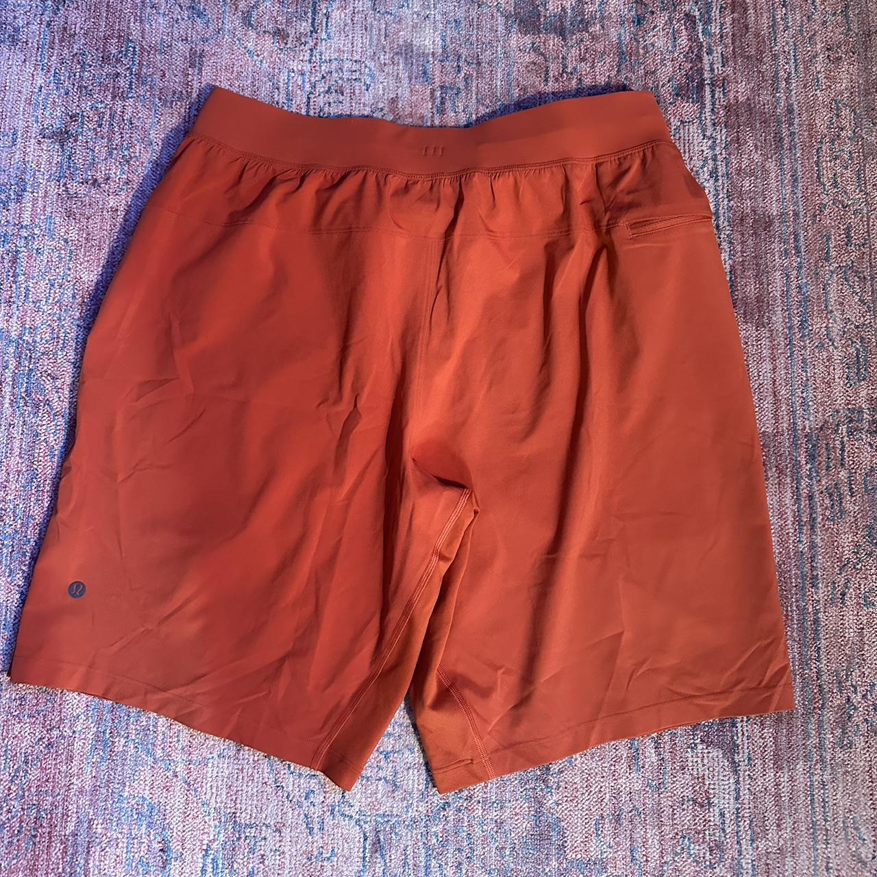 men’s orange athletic shorts tag is ripped off but... Depop