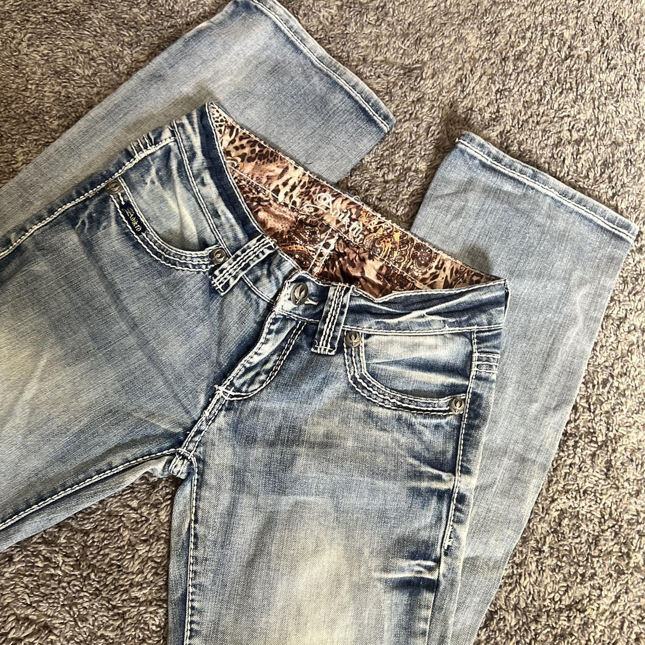Low waisted raw hem embroidered western style jean - Depop