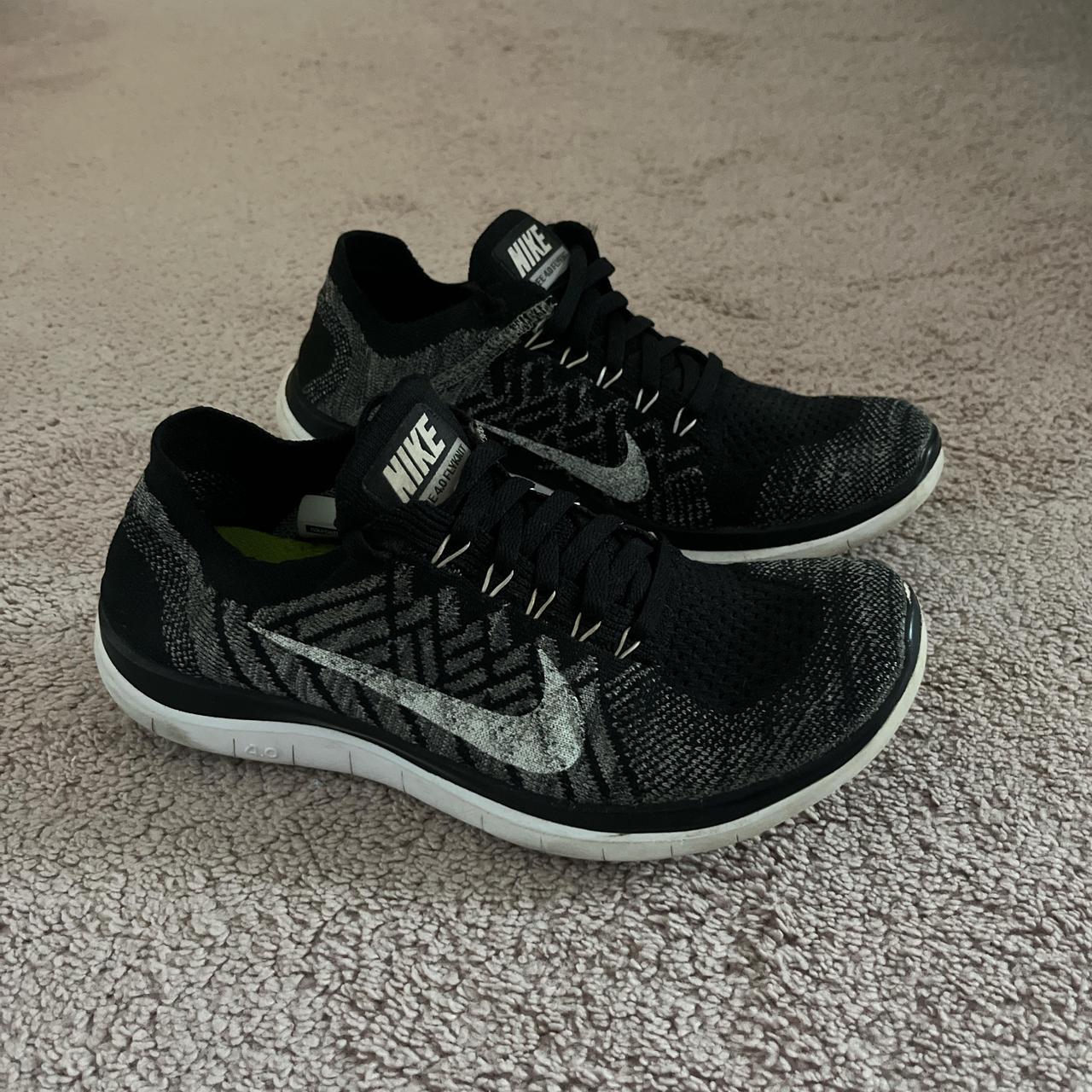 Black Free 4.0 Flyknit Nike Trainers. UK size 4.... - Depop