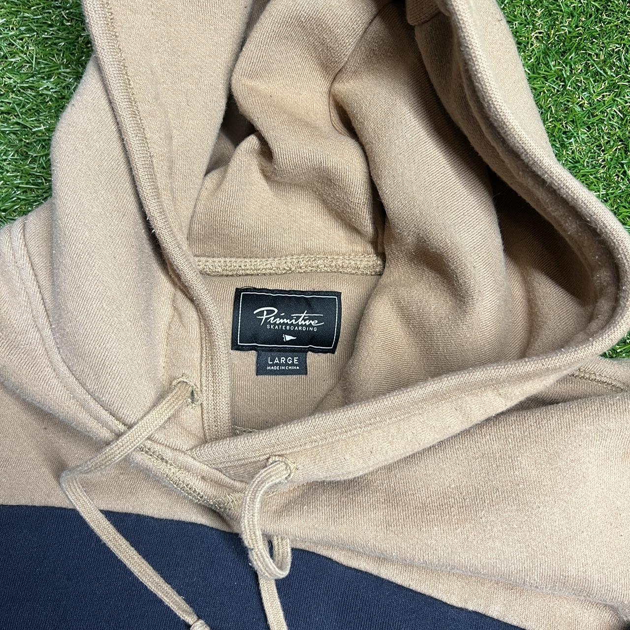 Primitive Men's Tan and Black Hoodie | Depop