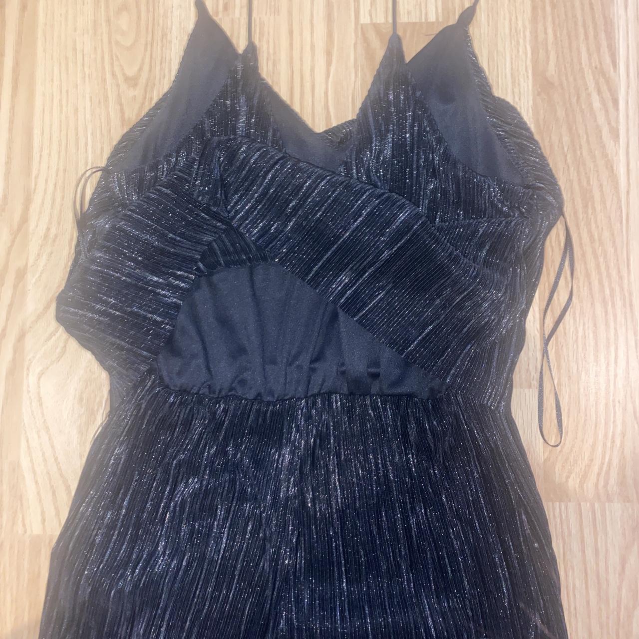 shiny romper/playsuit kind of has the illusion of a... - Depop