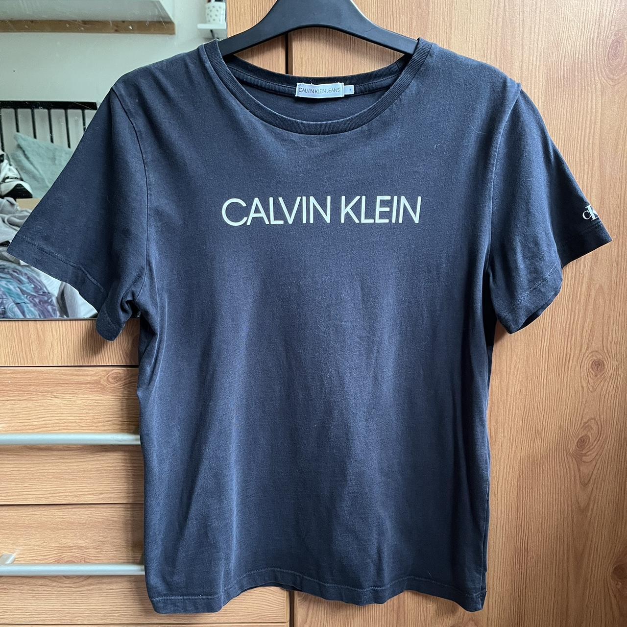 Calvin klein black Tshirt Size 14. But comes up... Depop
