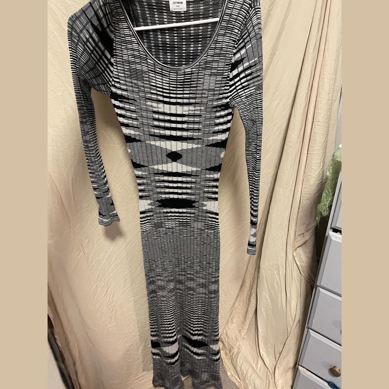 Sexy form fitting knit dress. Stretches very long I