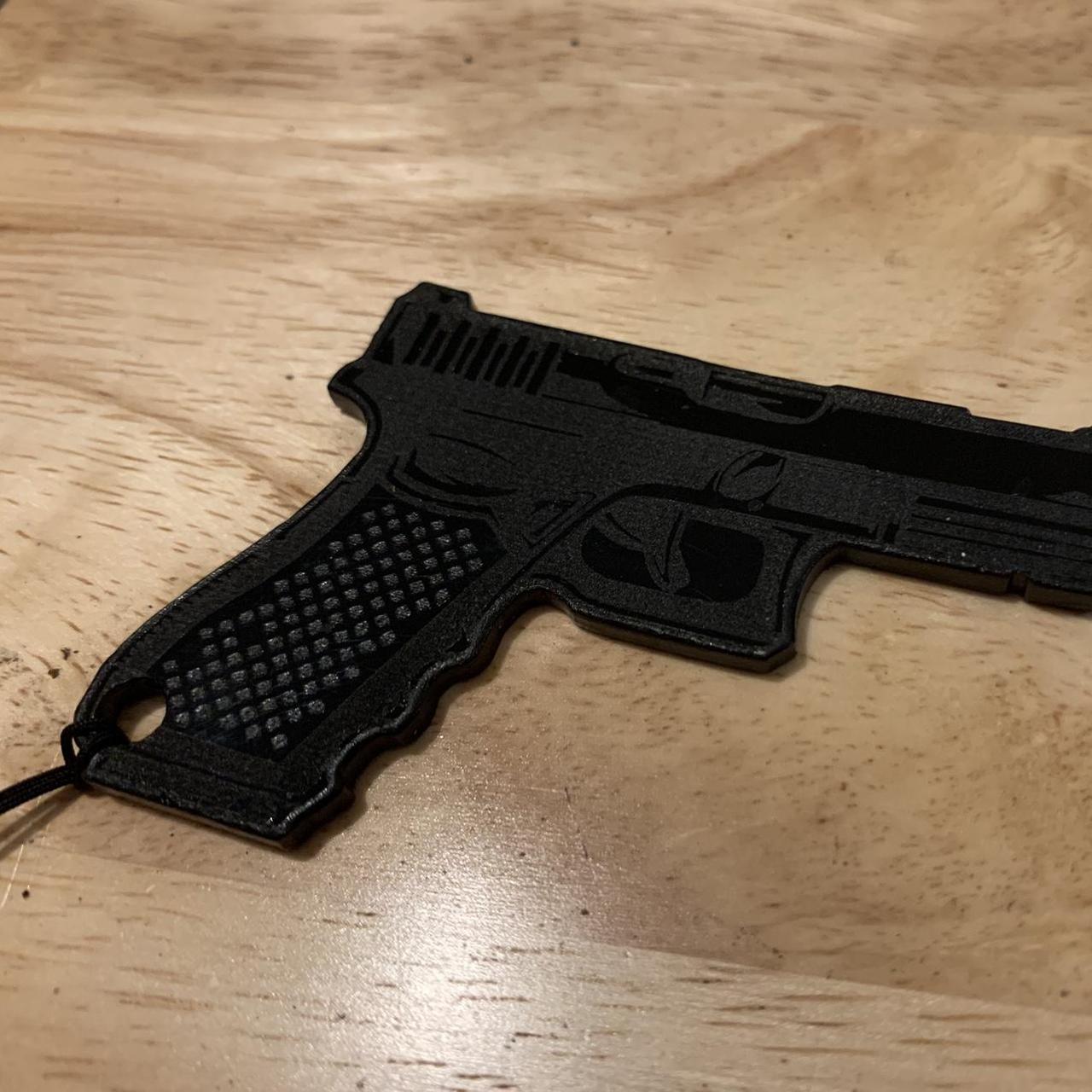 I have these handmade acrylic Glock keychains.... Depop