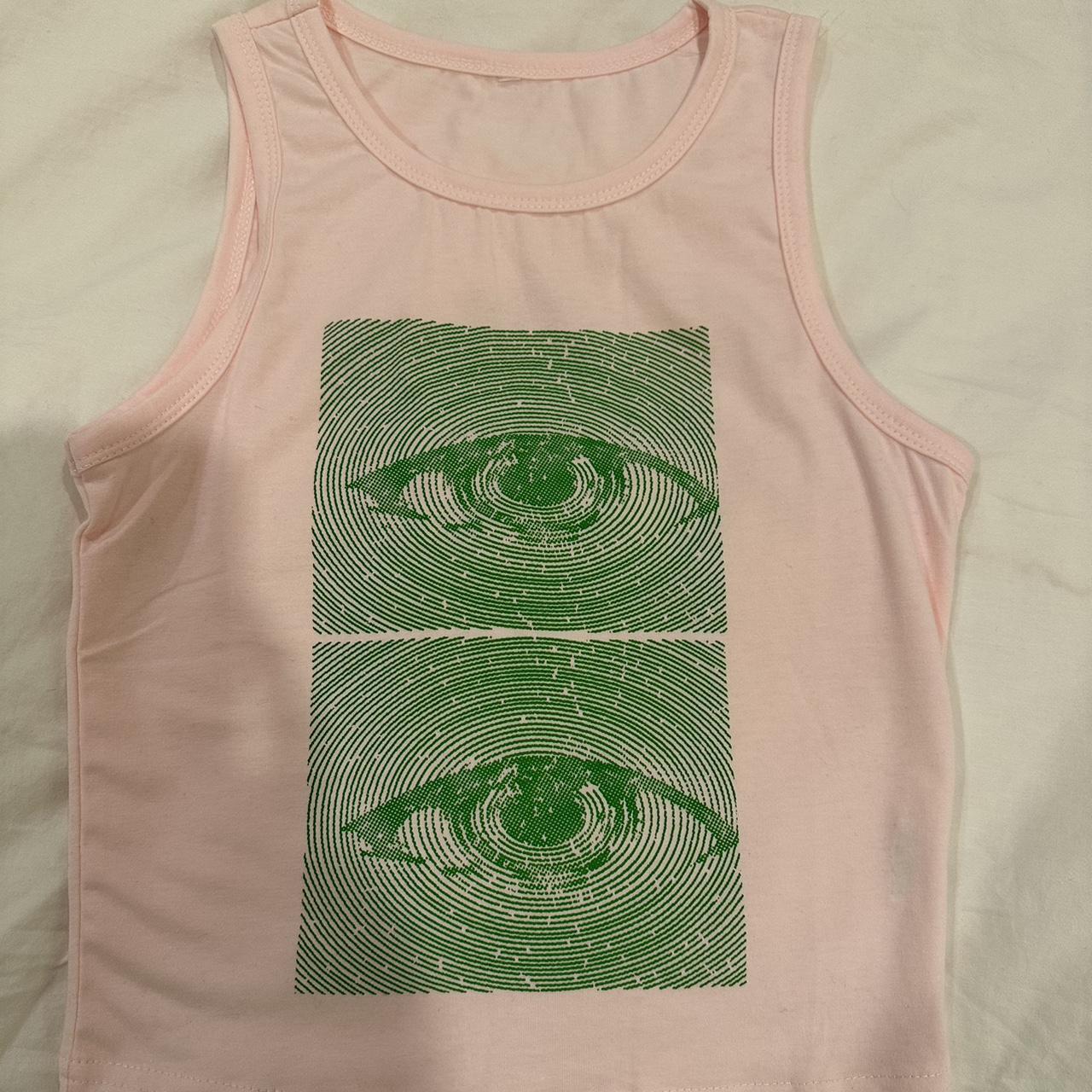 Cute pink tank top with green eyes pattern -never - Depop