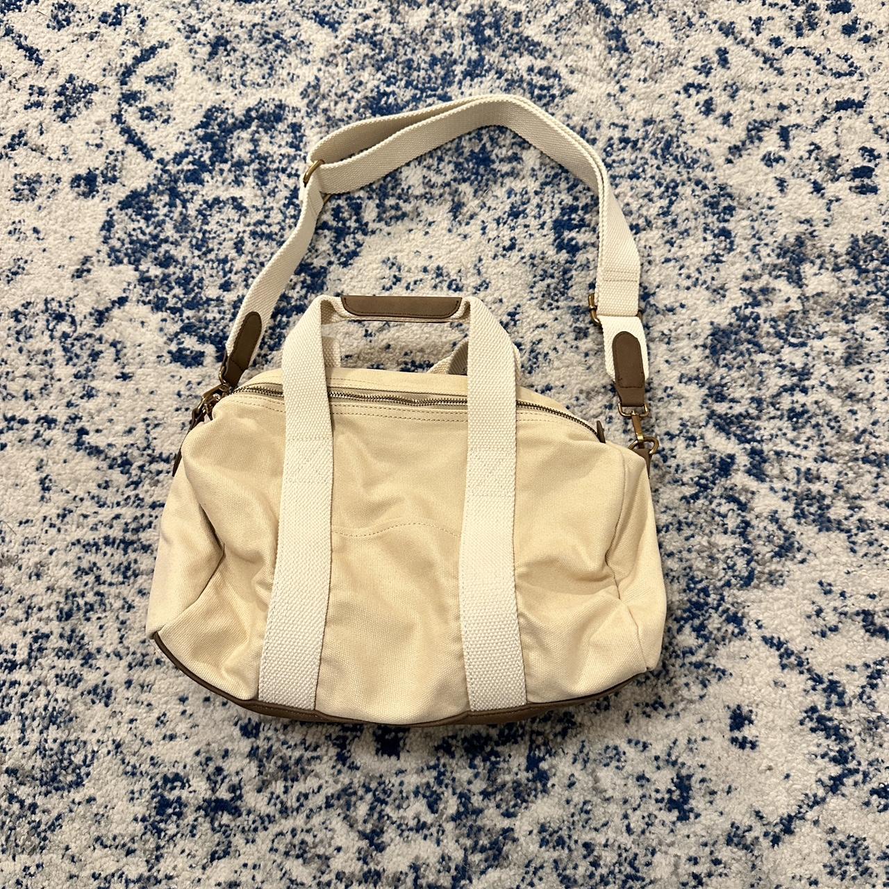 Brandy Melville cream Mini Duffel bag. Never used,... - Depop