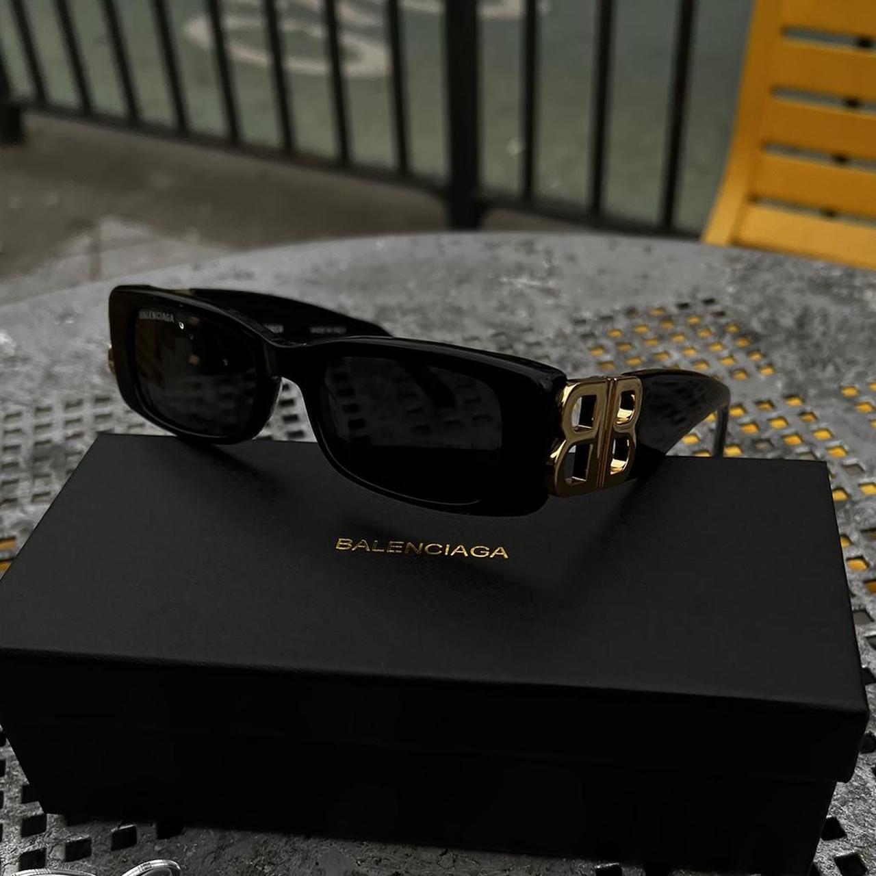 Balenciaga Men's Black and Gold Sunglasses | Depop