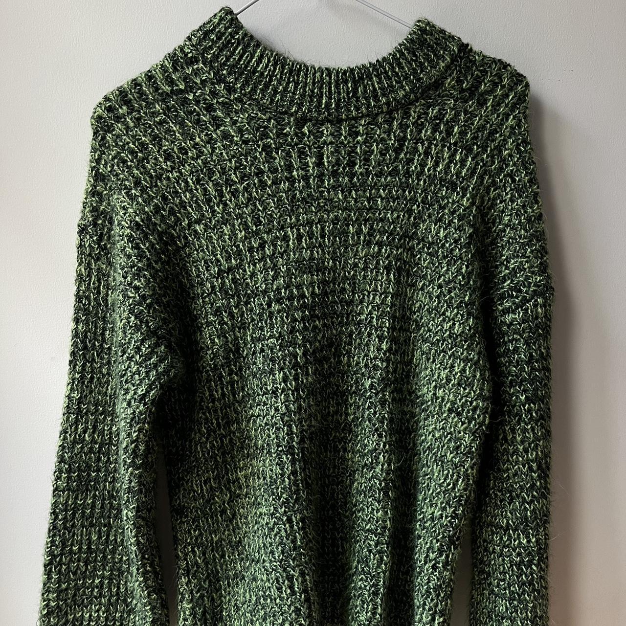 Green and black sweater from asos, the green is a... Depop