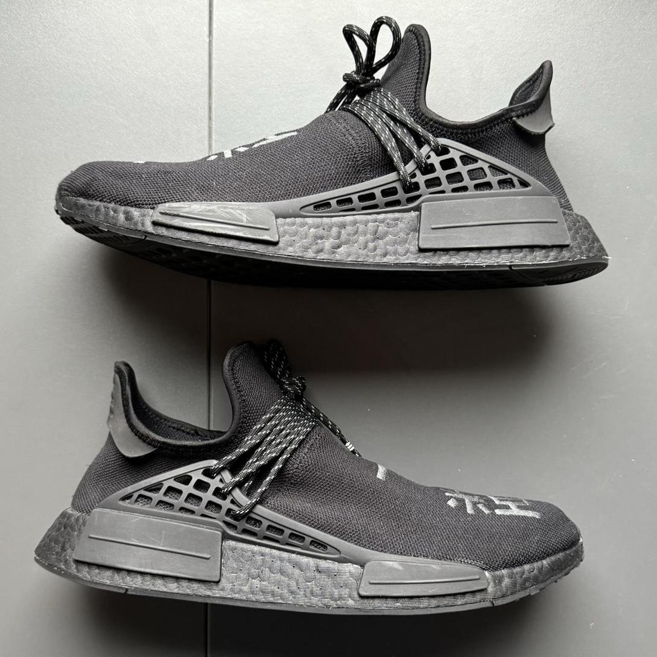 nmd human race triple black