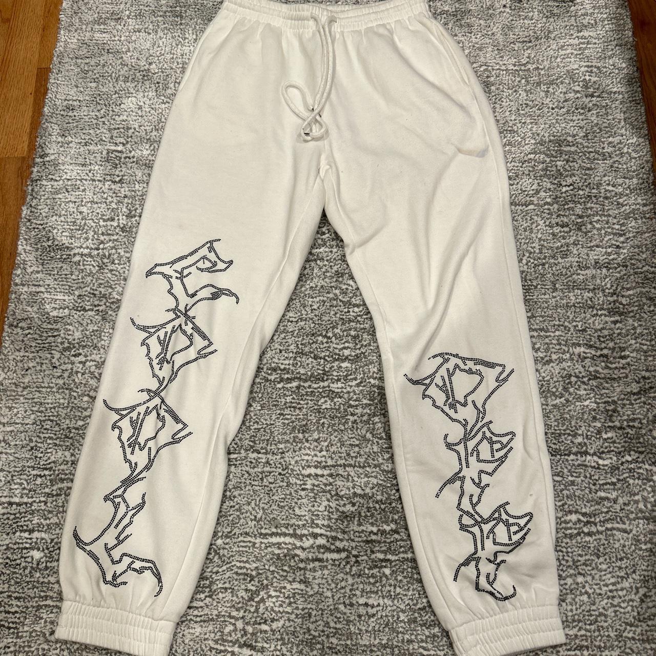 Adika Sparkle Sweatpants Stain Near Pocket Shown - Depop