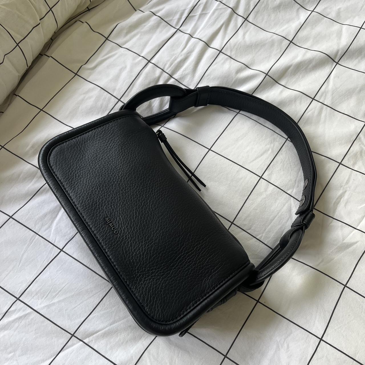 Mimco contort shoulder bag in black. Sold out online... Depop