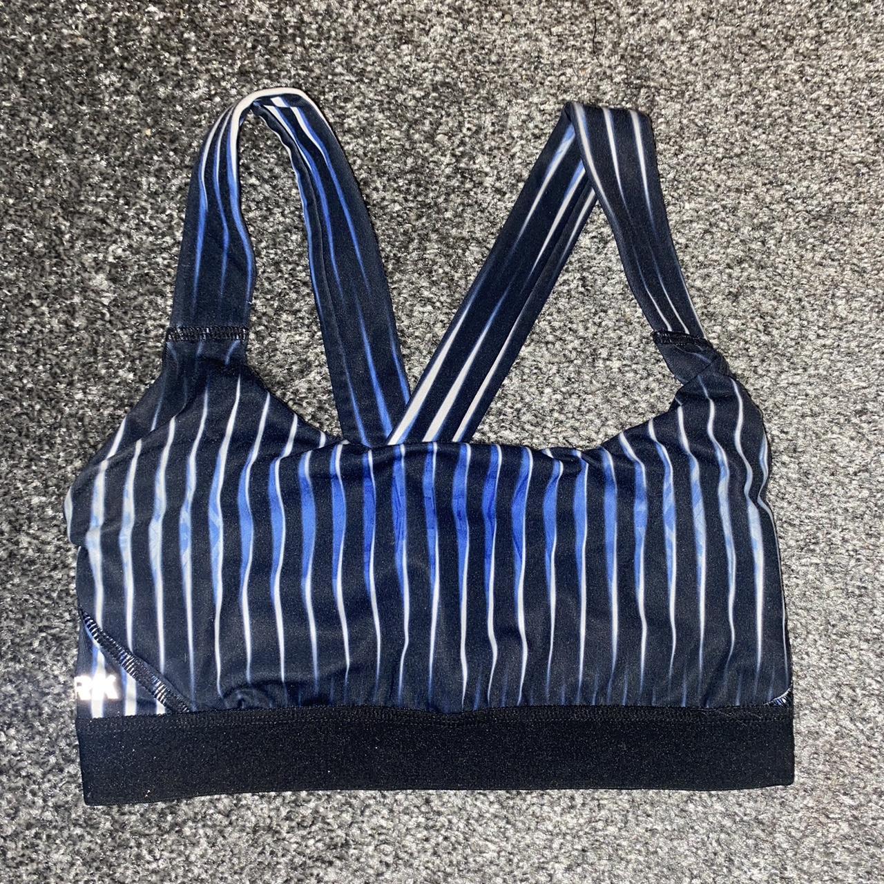 Ivy Park blue sports bra in size xs. In good