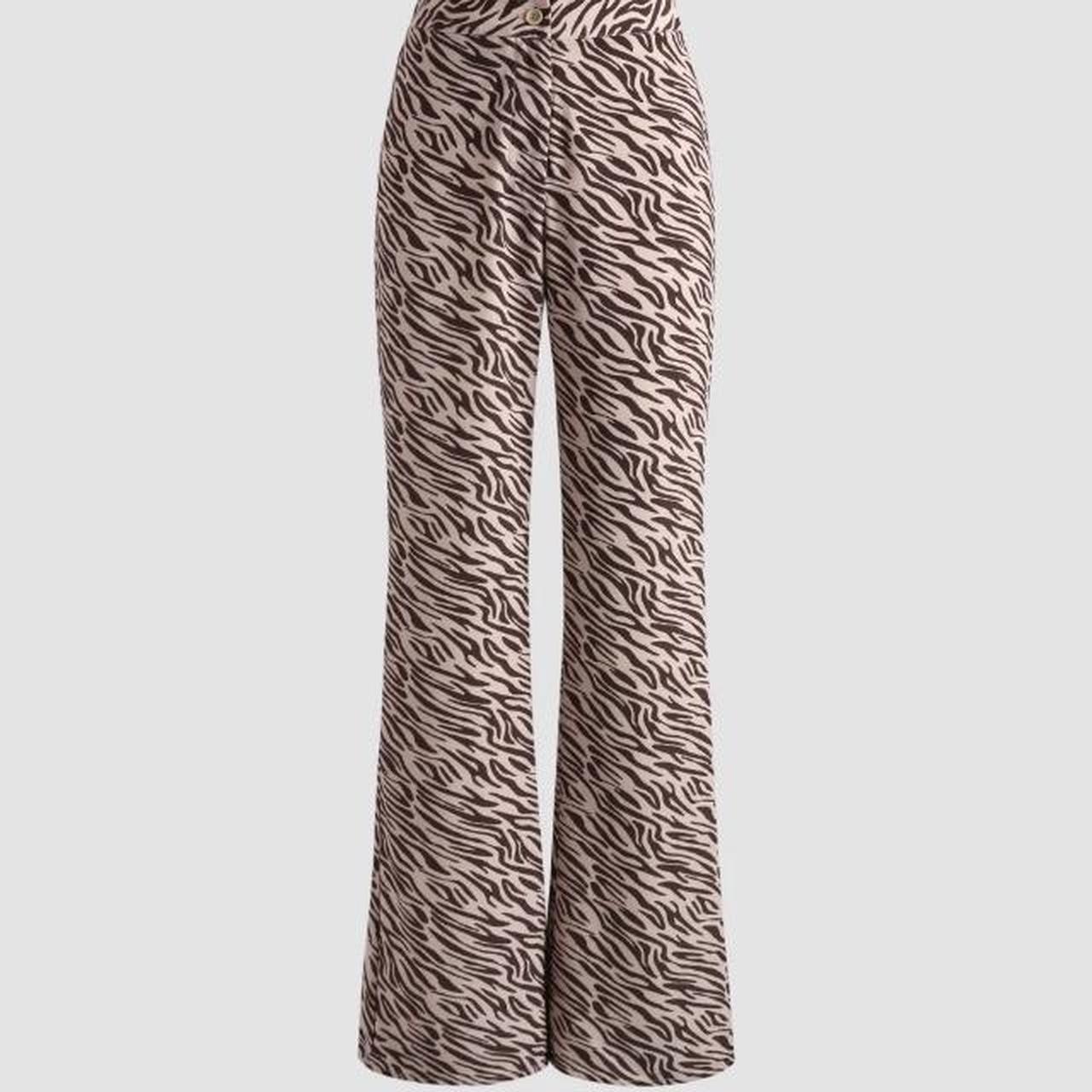Zebra print pants flare Size S Cider... Depop