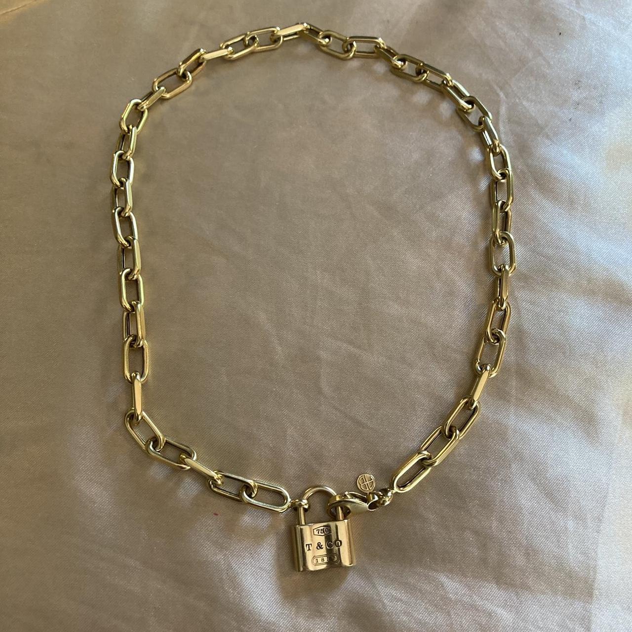 Styled like the retired Tiffany yellow gold dog tag... Depop