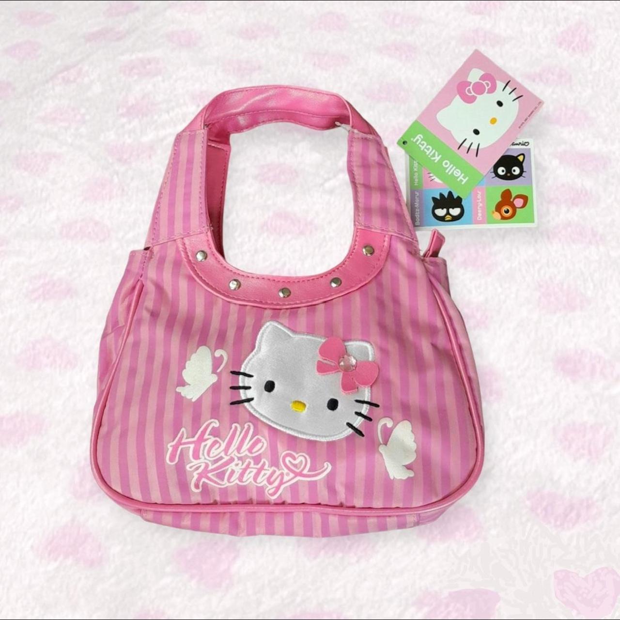 Hello popular kitty purse ‼️do not purchase taking offers‼️