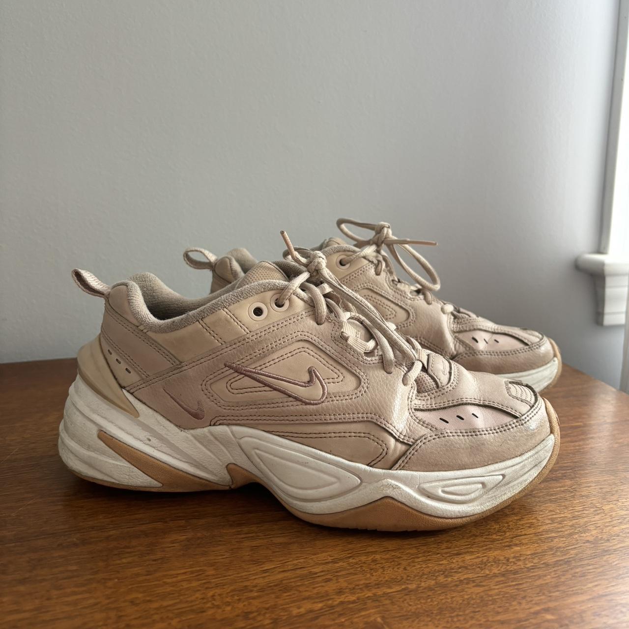 Nike sneaker light pink nude color some signs