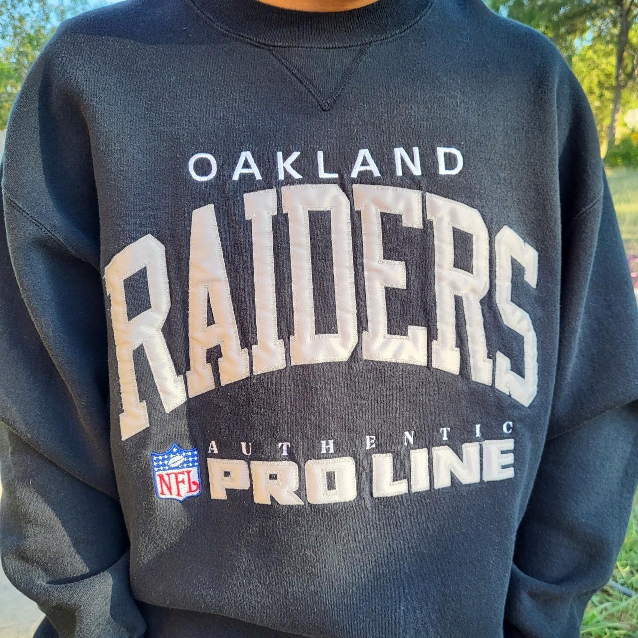 Vintage 90's Oakland Raiders sweatshirt. Russell