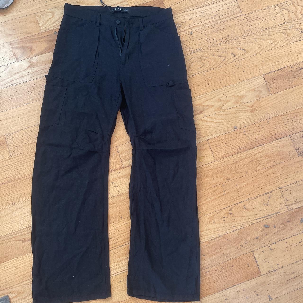 Lioness black cargo pants They say size small but... - Depop