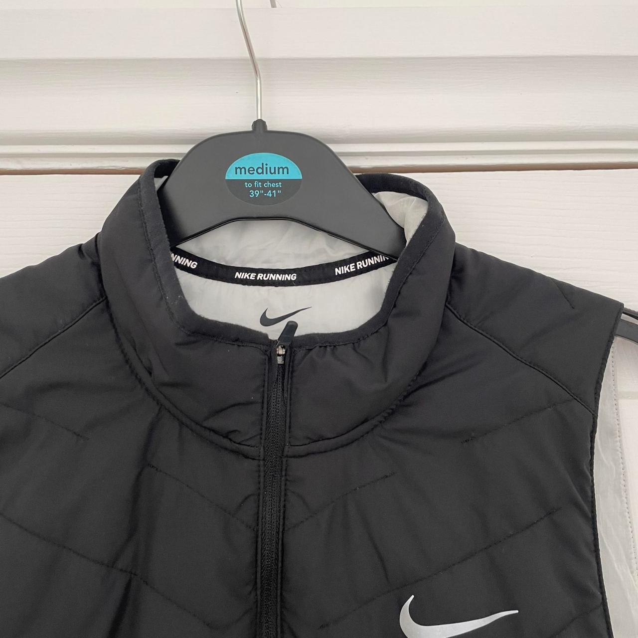 Nike Men's Black and Grey Gilet | Depop