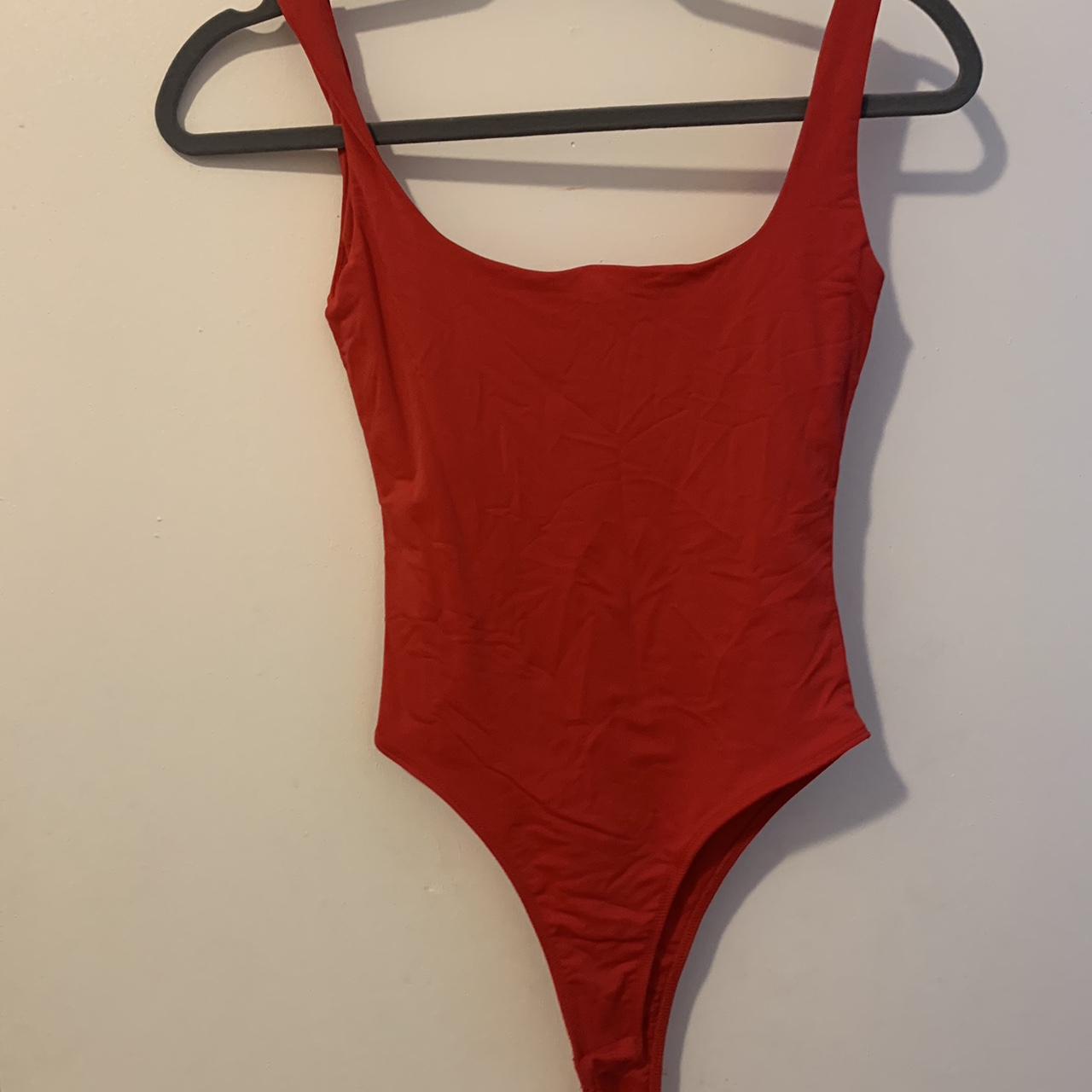 Cute red bodysuit! Nice and tight and double lined... Depop