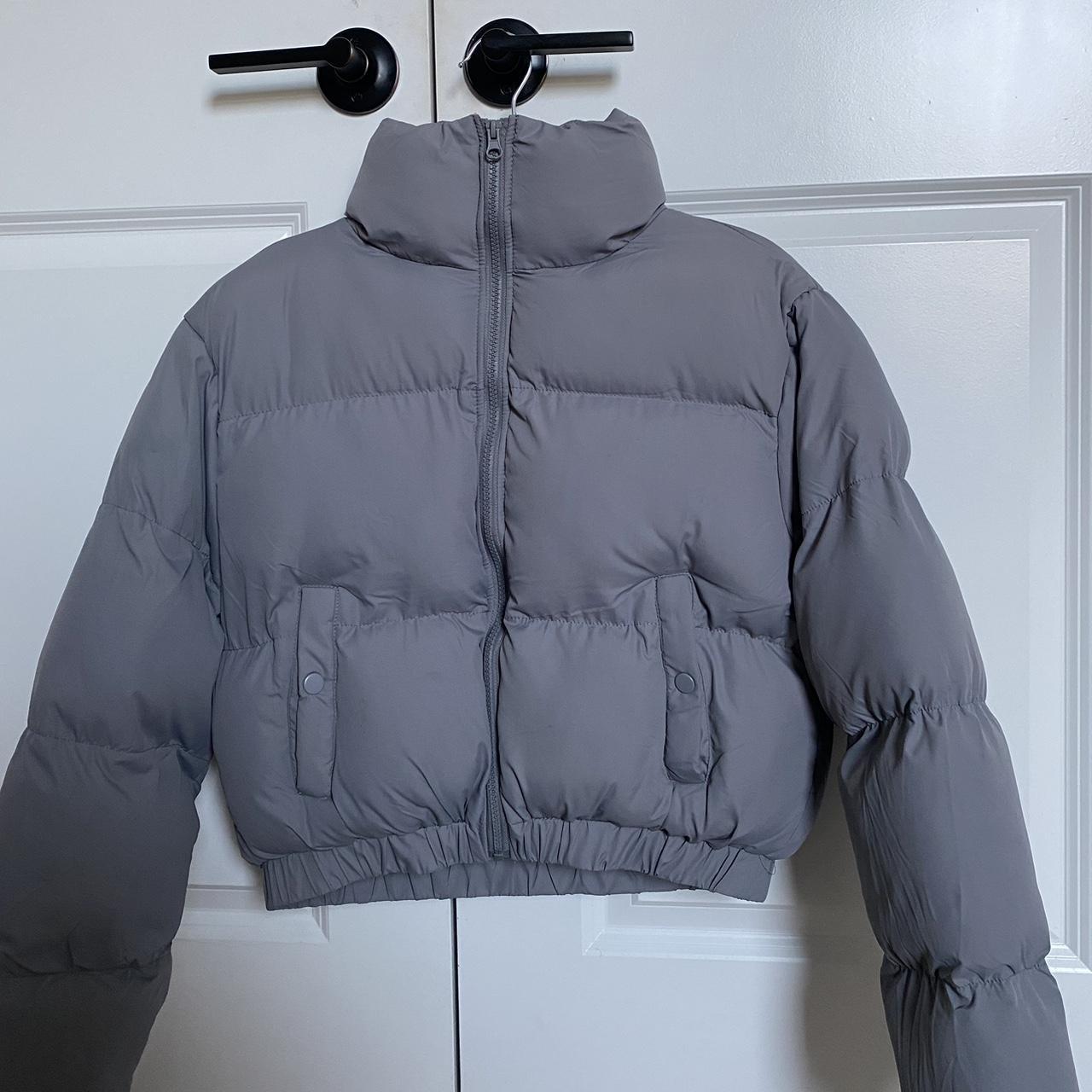 grey ANWND cropped puffer jacket, price is... - Depop