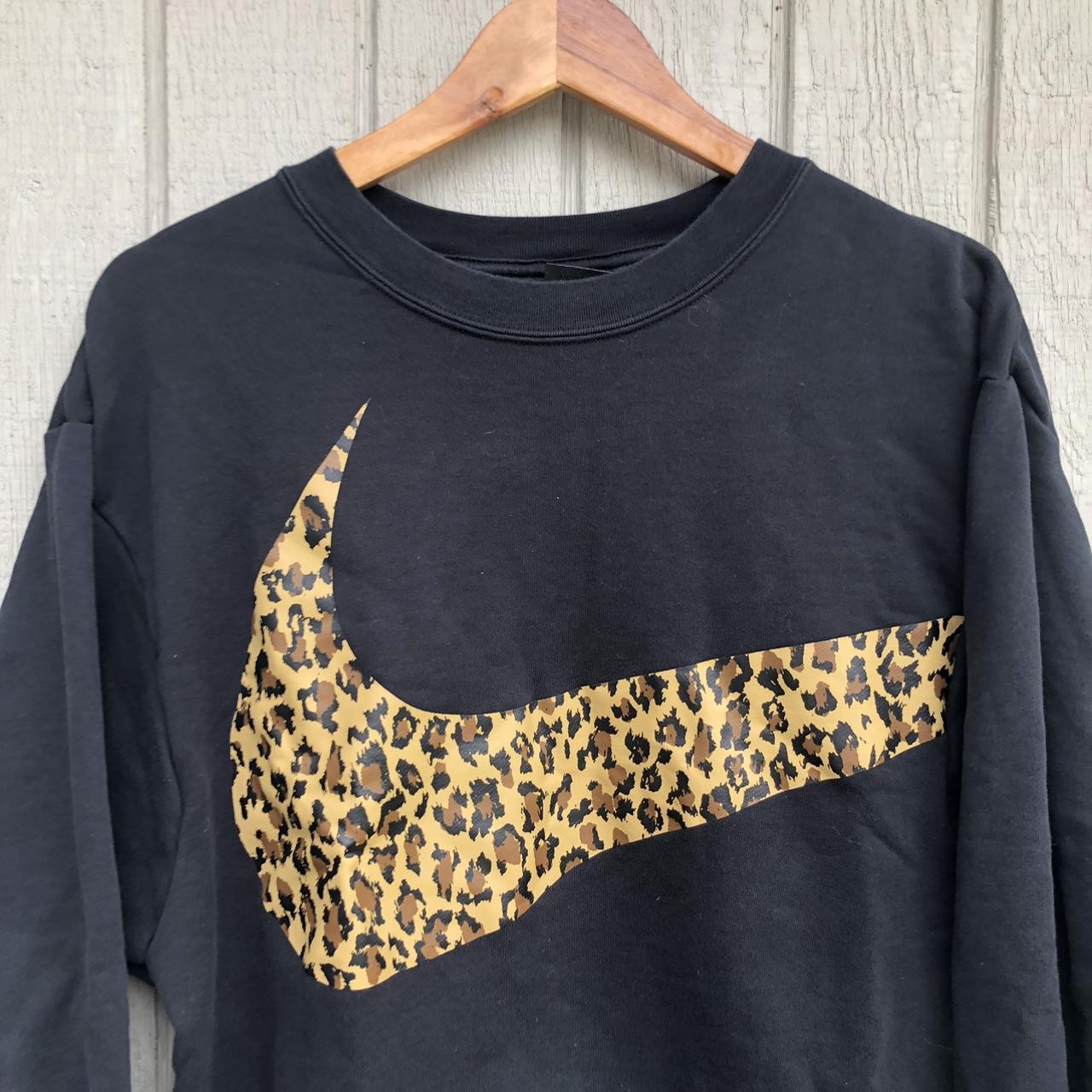 Black Nike crewneck sweatshirt with leopard print