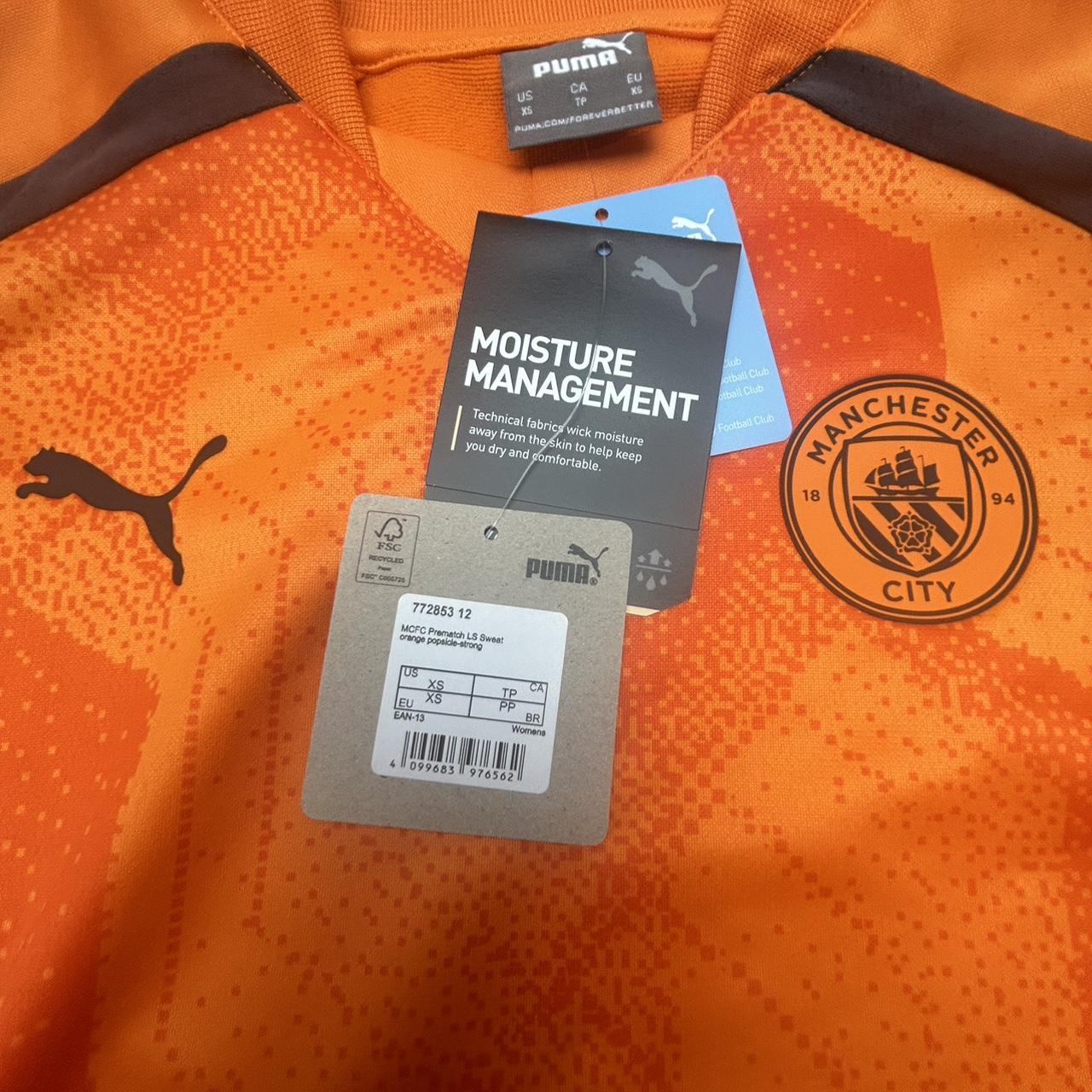 Manchester City orange long sleeve training