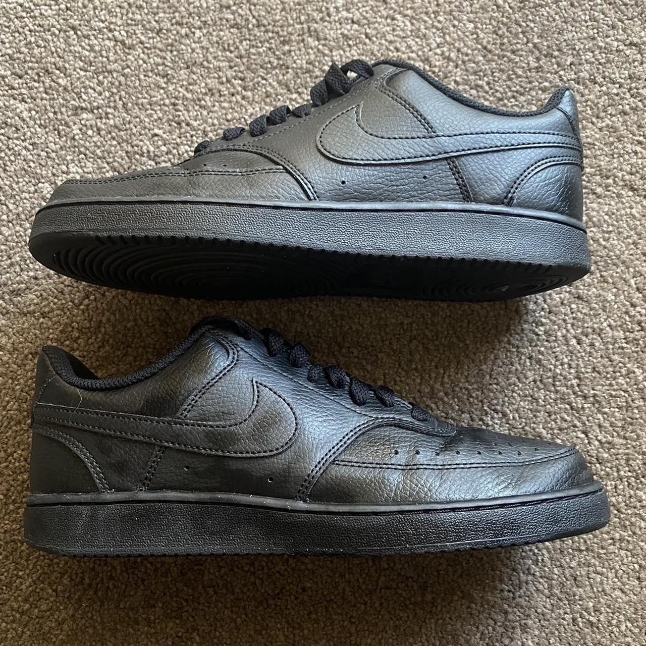 basic black nike shoes