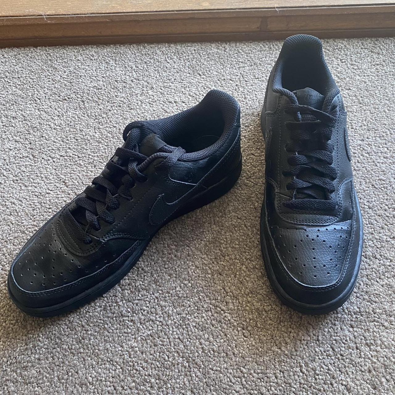 basic black nike shoes