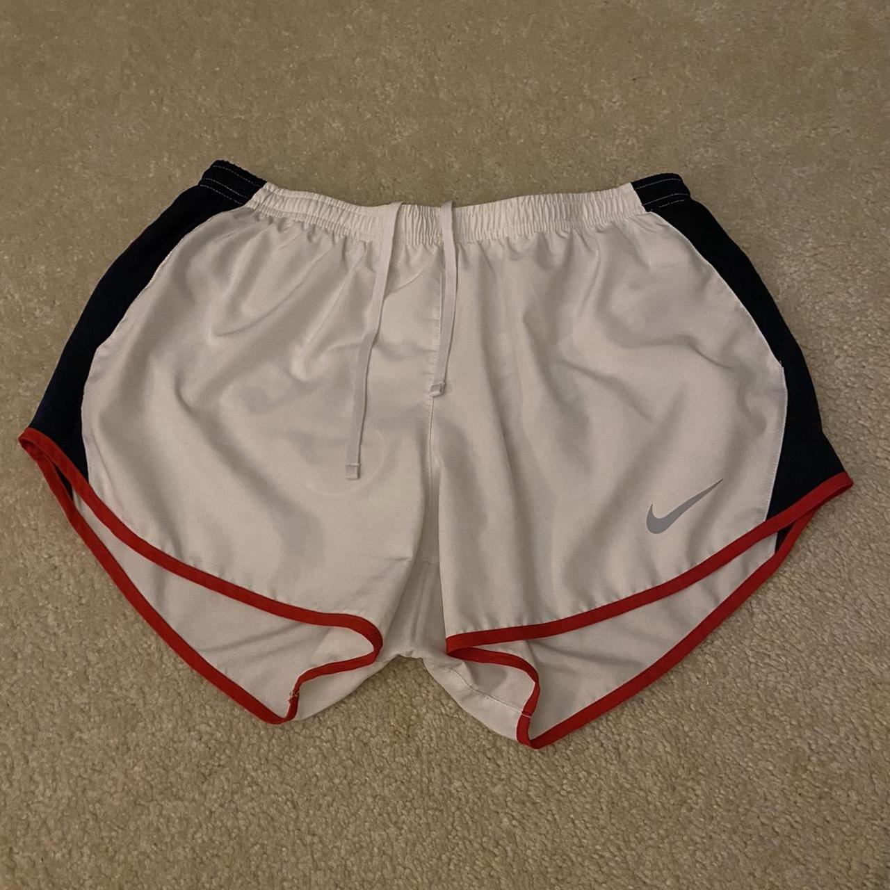 red white and blue nike shorts, worn a few times but... - Depop