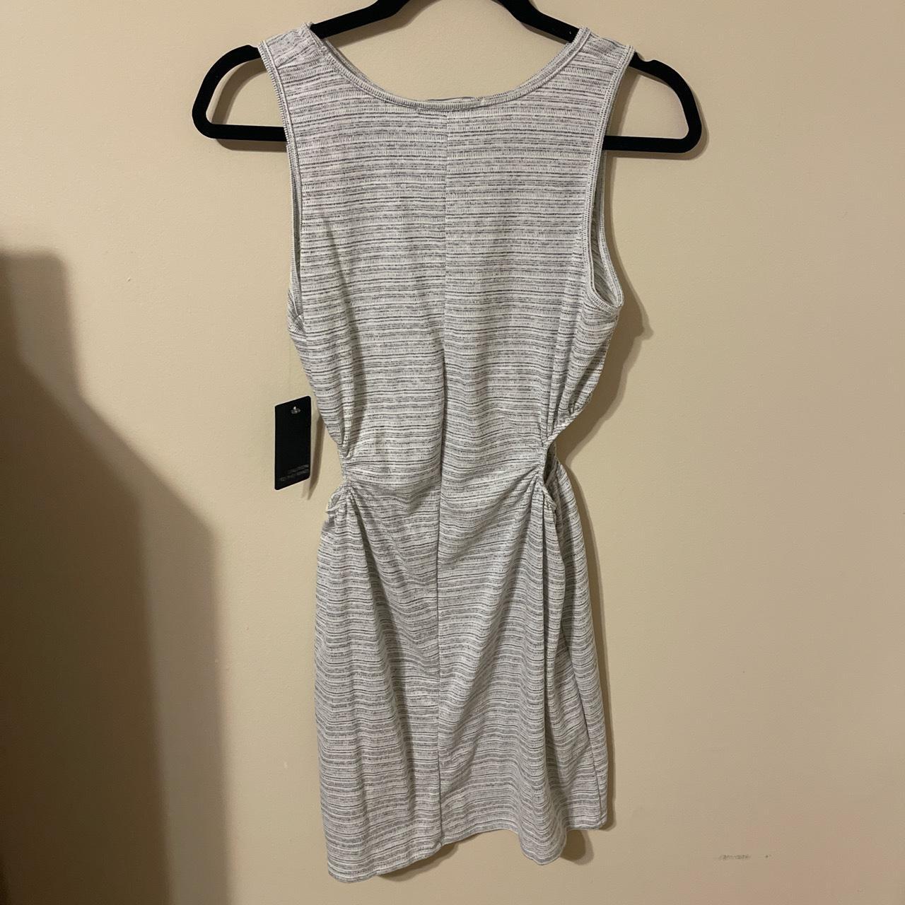 Grey and white lightweight dress, openings on both... - Depop