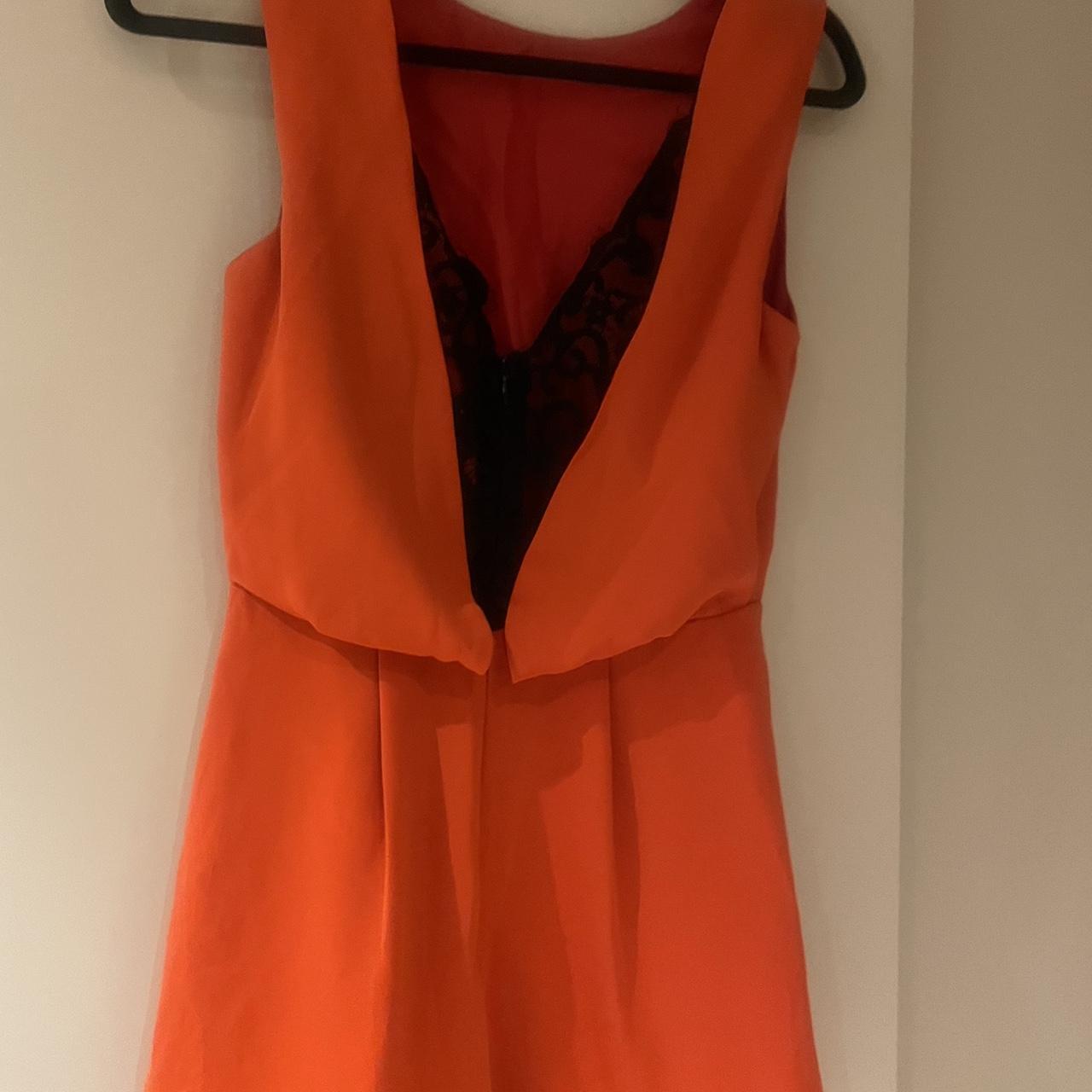 Orange play suit with black lace back. River island. Depop