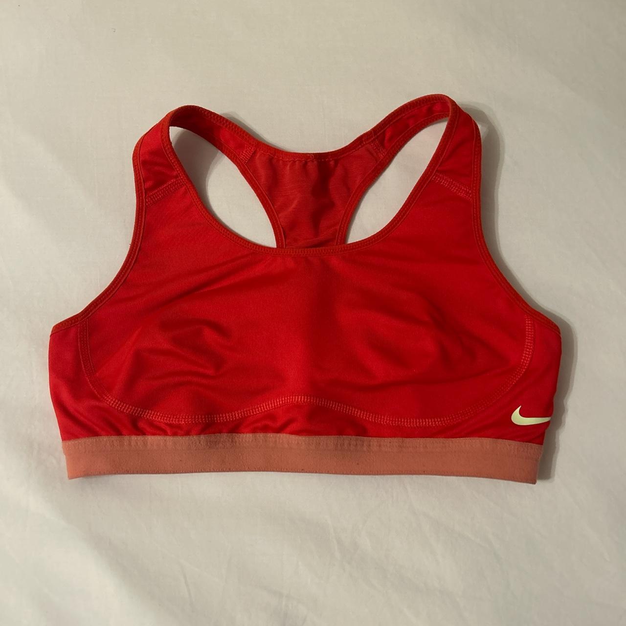 Bright pink/red Nike sports bra, high support good... Depop