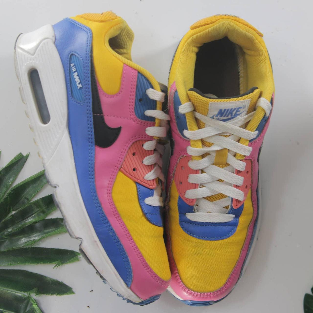 Pink blue clearance yellow nikes