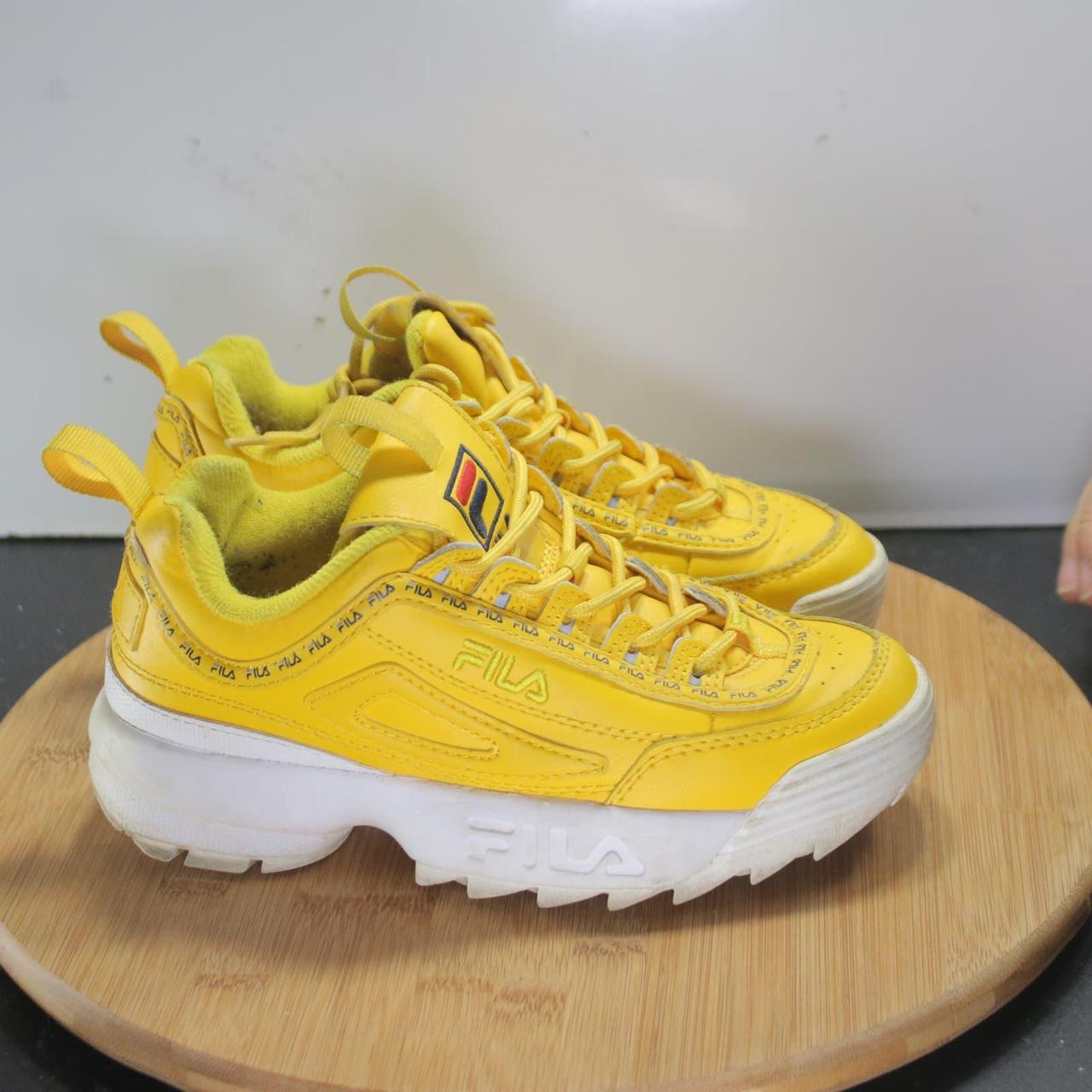 Fila disruptor low yellow hotsell