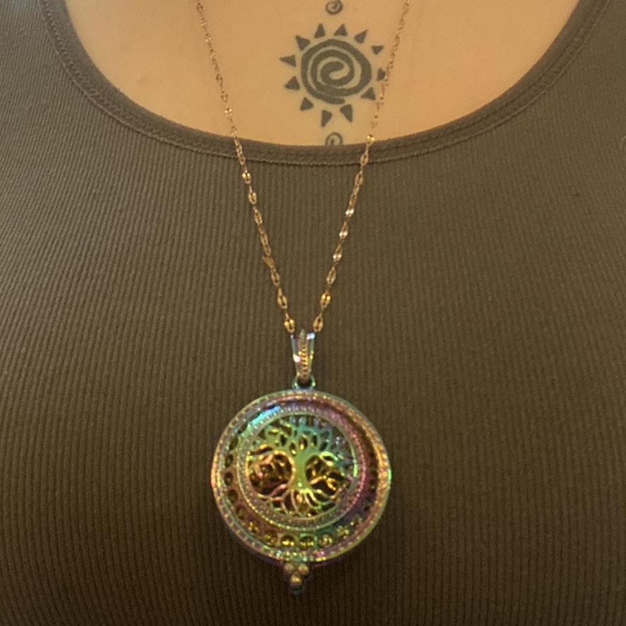 locket for essential oils. You put a cotton... Depop