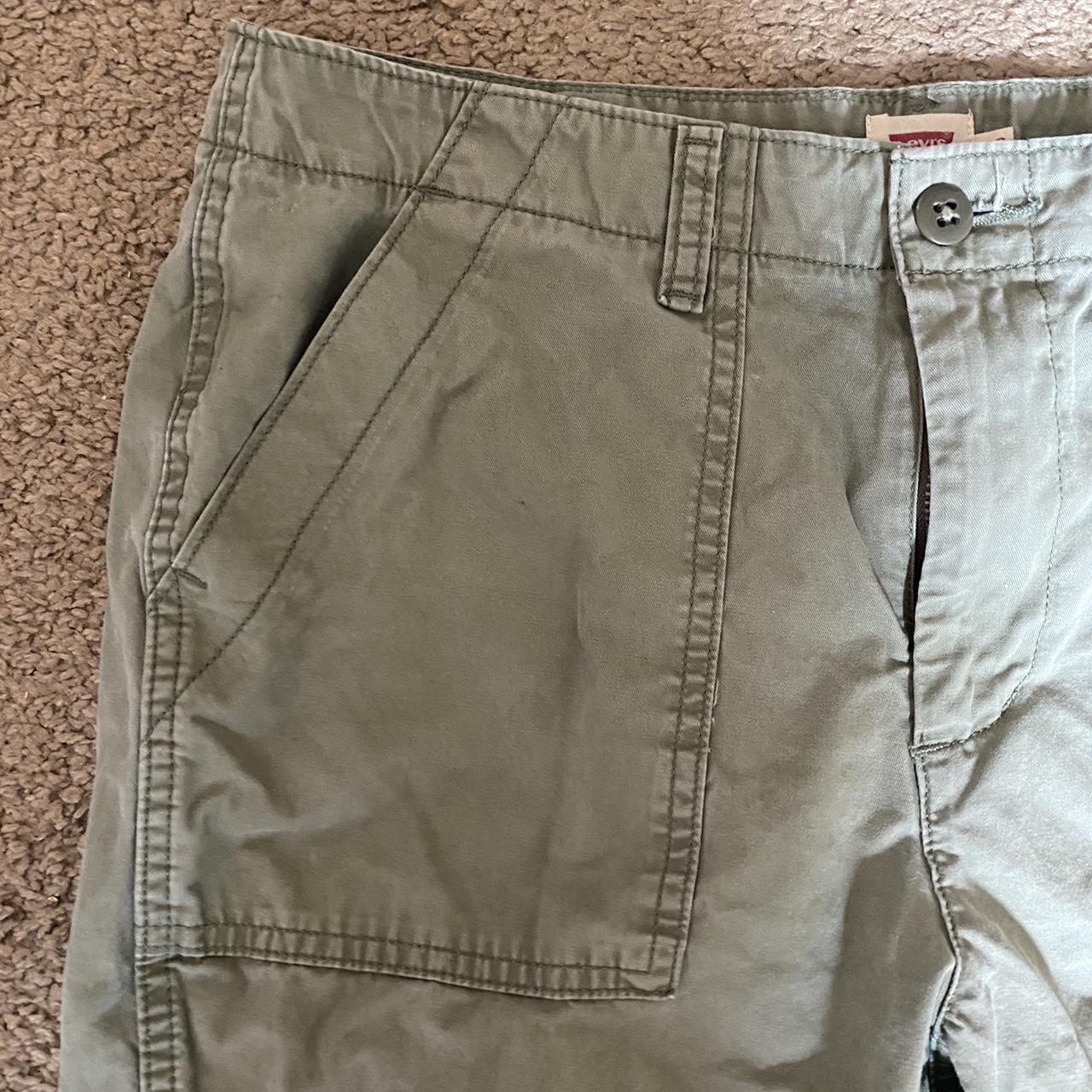 Low waisted Levi cargo pants - Depop