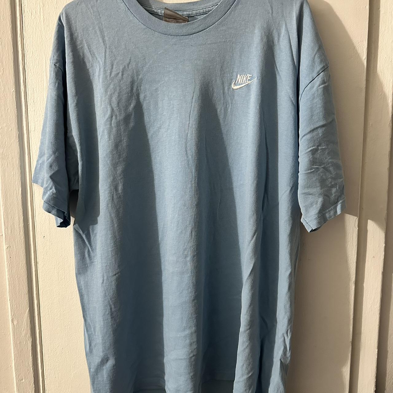 university blue nike shirt