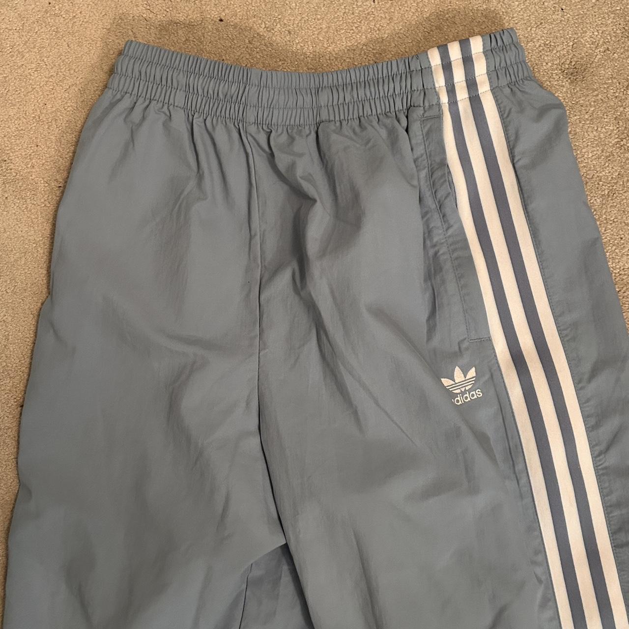 Baby blue adidas track pants Super comfy and... Depop