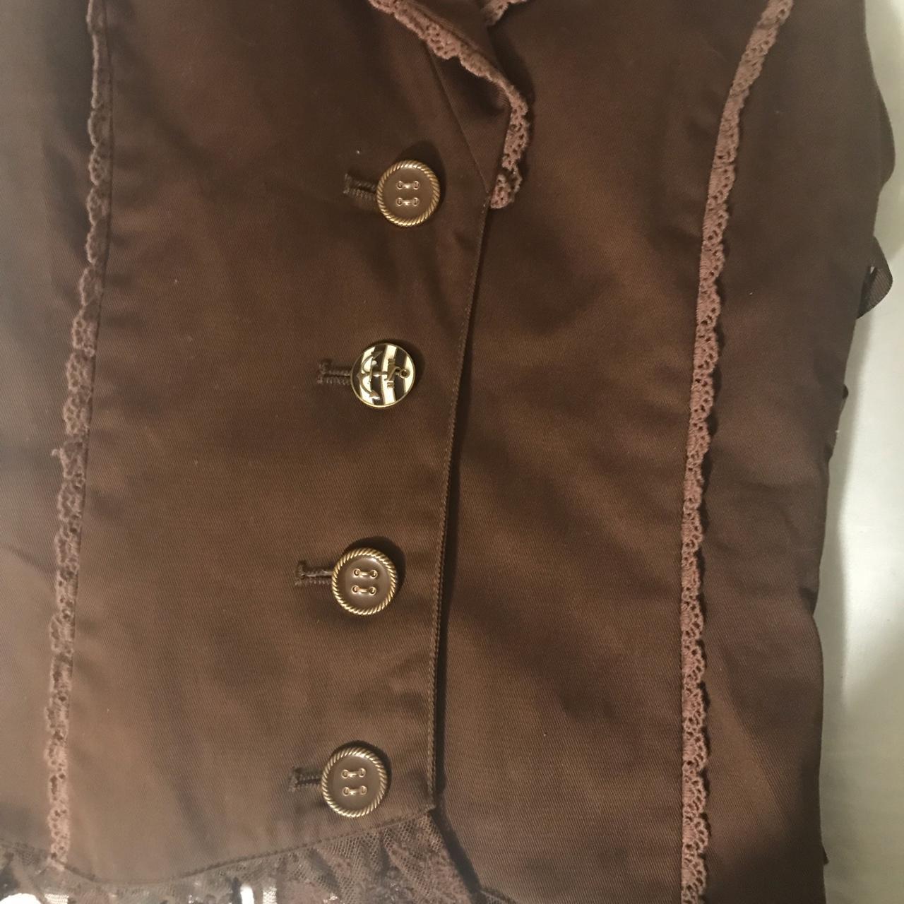 brown axes femme vest size medium, fits a size us... Depop