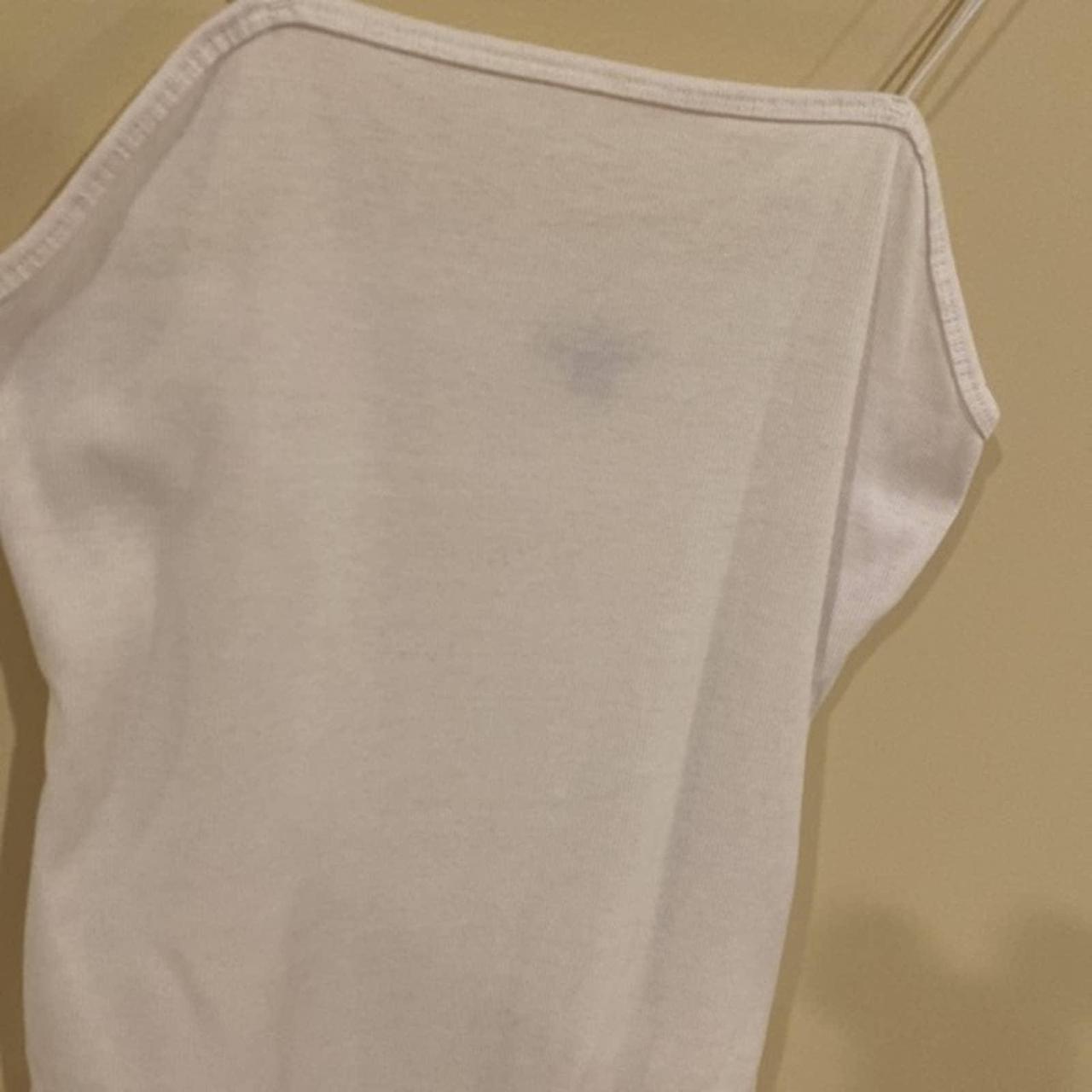 White bodysuit Gently used. The black mark you see - Depop