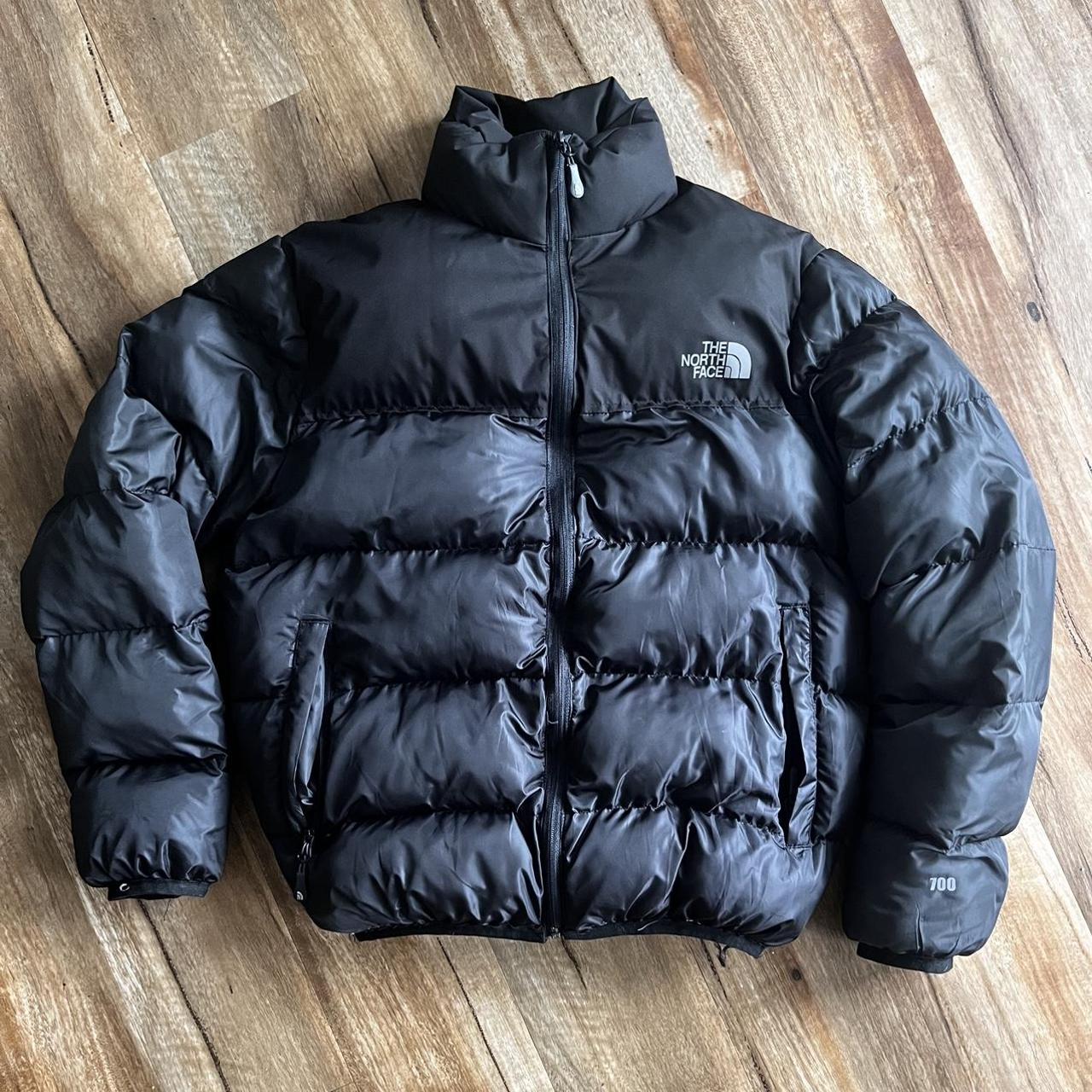 The North Face puffer jacket. Good condition, hole... - Depop