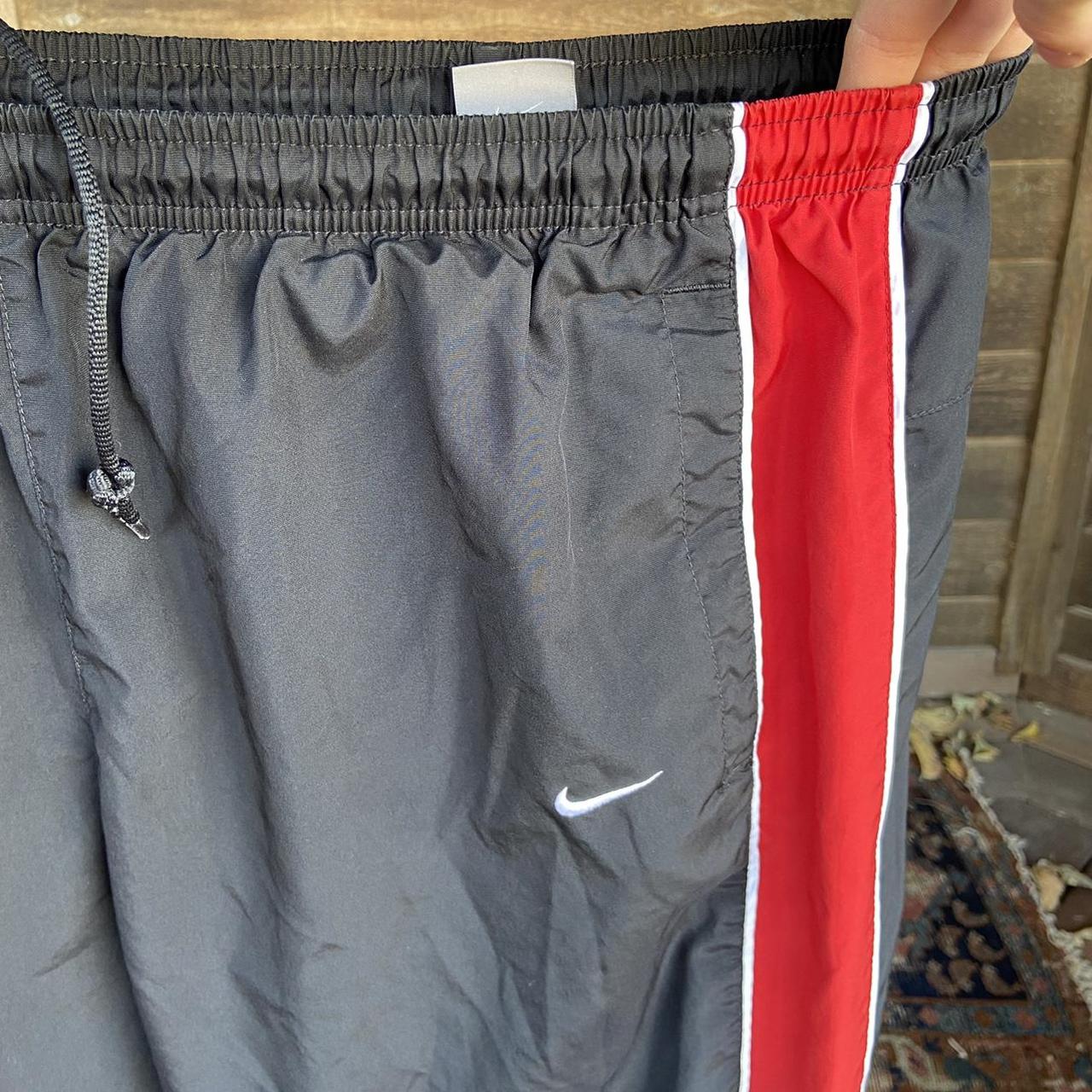 Y2k Nike track pants black and red good condition... Depop